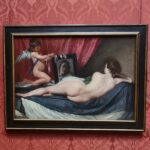 La Venus del Espejo de Diego Velázquez expuesta en la National Gallery de Londres, mostrando a Venus recostada de espaldas con un cupido sosteniendo un espejo